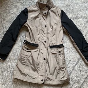 Tan and black wind breaker/rain coat